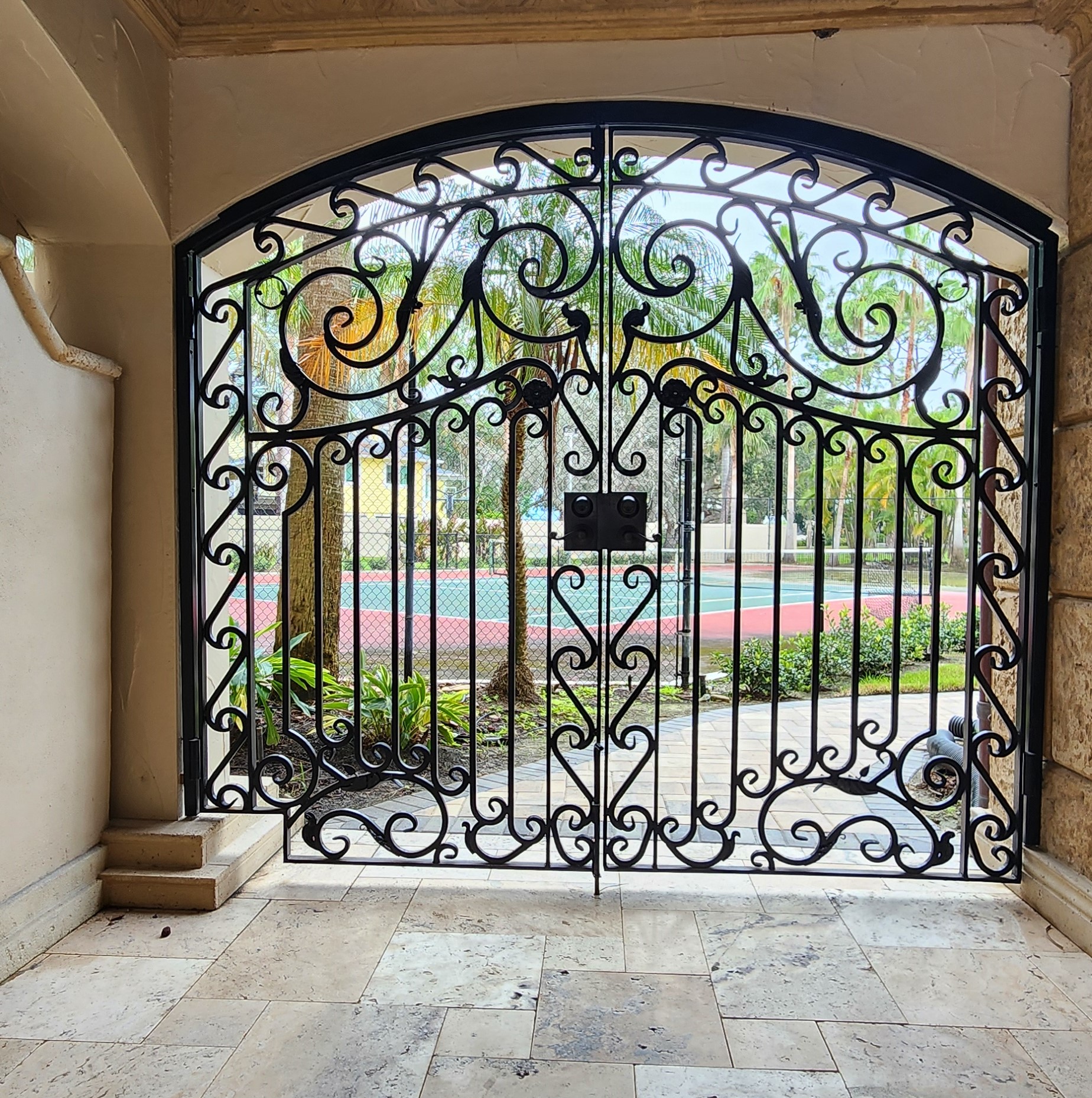 Custom iron gates that make an entrance.
