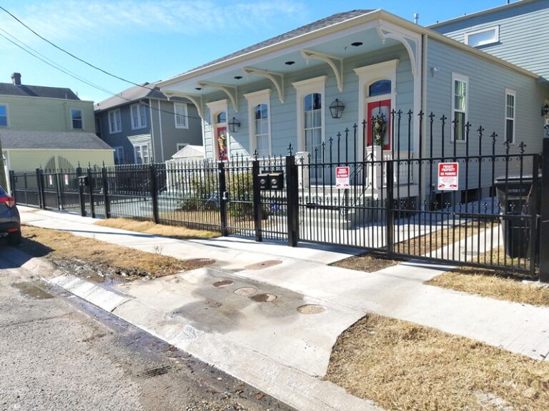 custom wrought iron fence with automatic driveway gate
