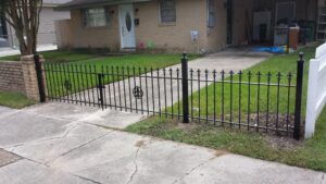 custom three feet high wrought iron driveway and fence