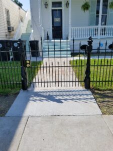 custom wrought iron entry gate with victorian posts