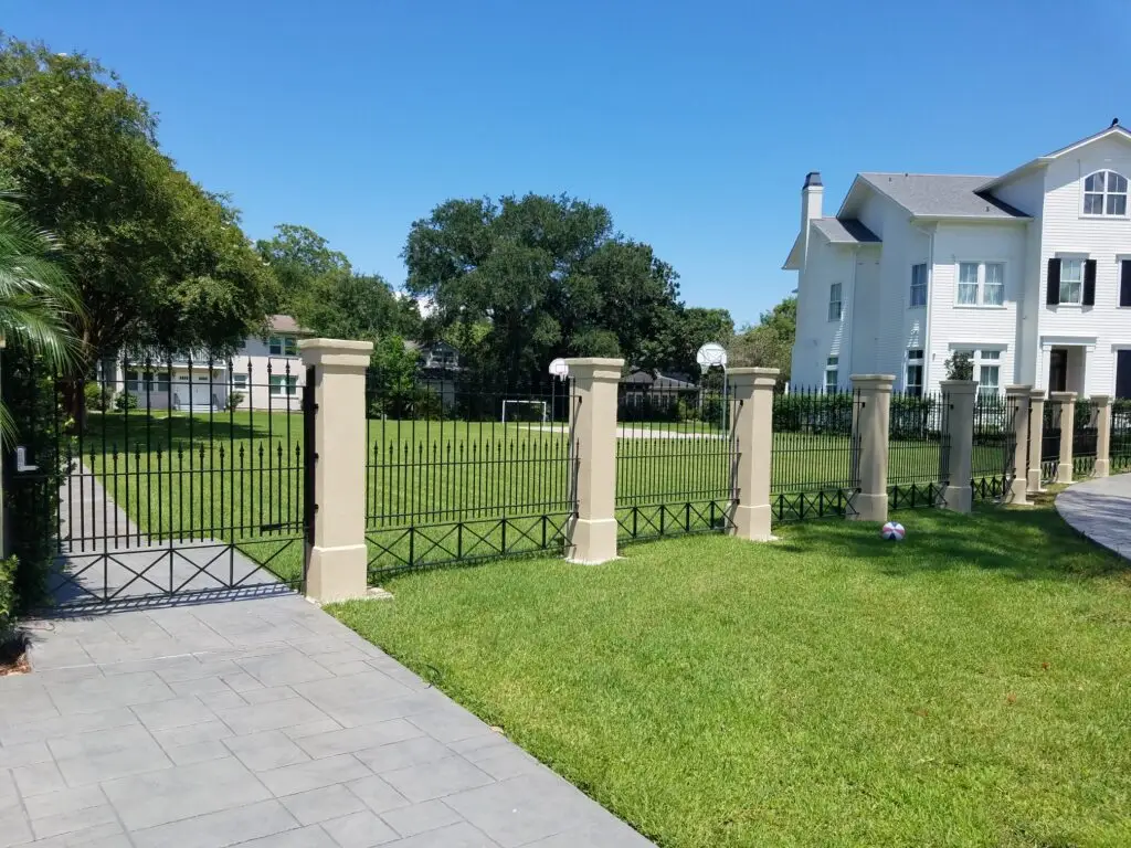 custom wrought iron fence for front yard with concrete columns