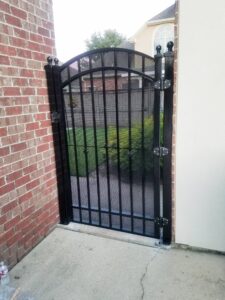 custom wrought iron gate with metal mesh