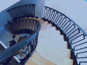 interior staircase wrought iron curve modern railing