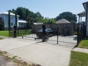 wrought iron fence with automatic driveway gate