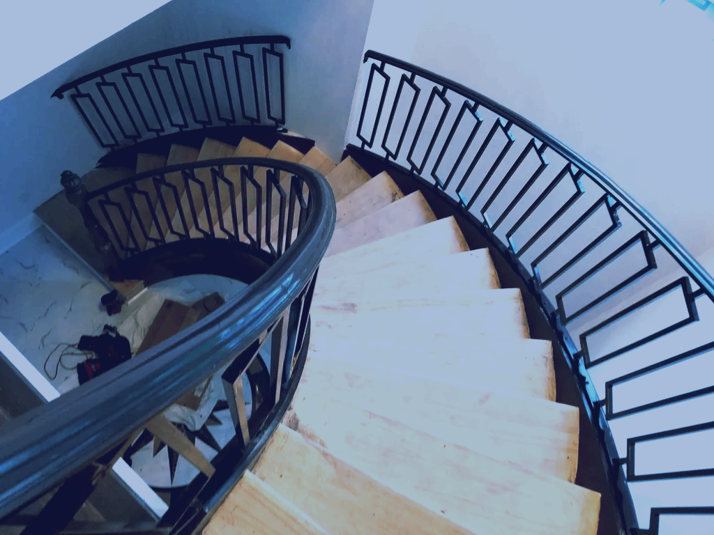 interior staircase contemporary wrought iron curved railing