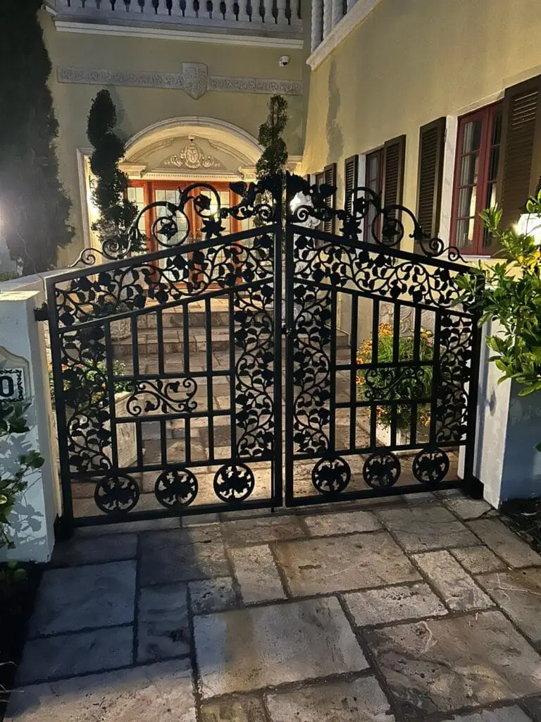 Custom black ornamental cast iron entry gate