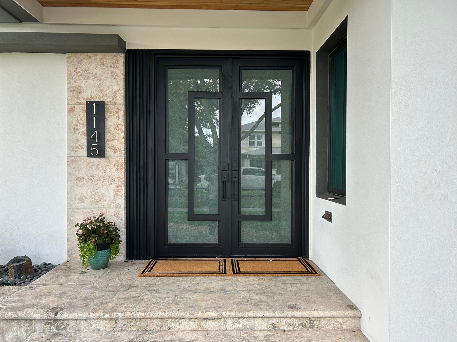 Custom wrought iron and clear glassfront door